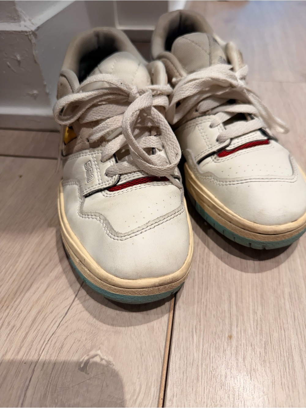 New Balance Kids Casual Lace-Up Sneakers in Cream and Light Blue